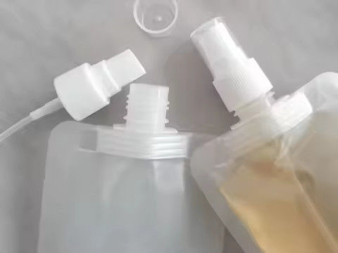 टोनिको उपचार और शैम्पू पैकेजिंग के लिए स्प्रे फ्लिप-टॉप के साथ कस्टम स्पूट बैग