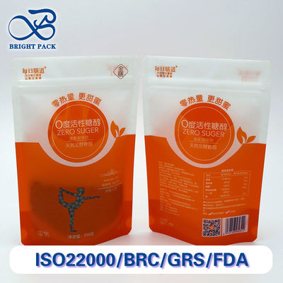 कस्टम अद्वितीय खिड़कियों और मुद्रण पैटर्न के साथ खाद्य पैकेजिंग के लिए नमी-सबूत स्टैंड-अप बैग।